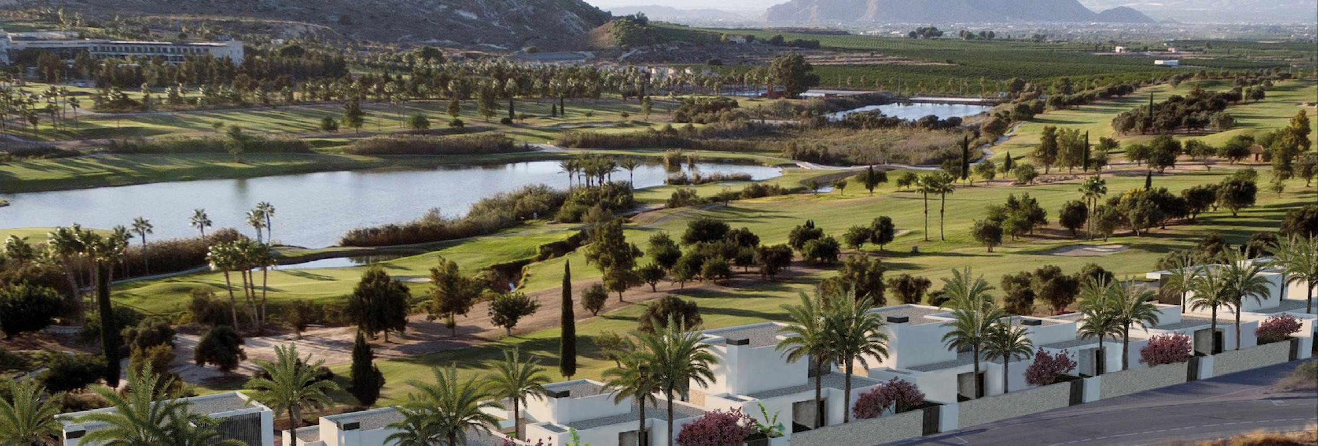 La Finca Golf Course with fairways, water features and mountain views
